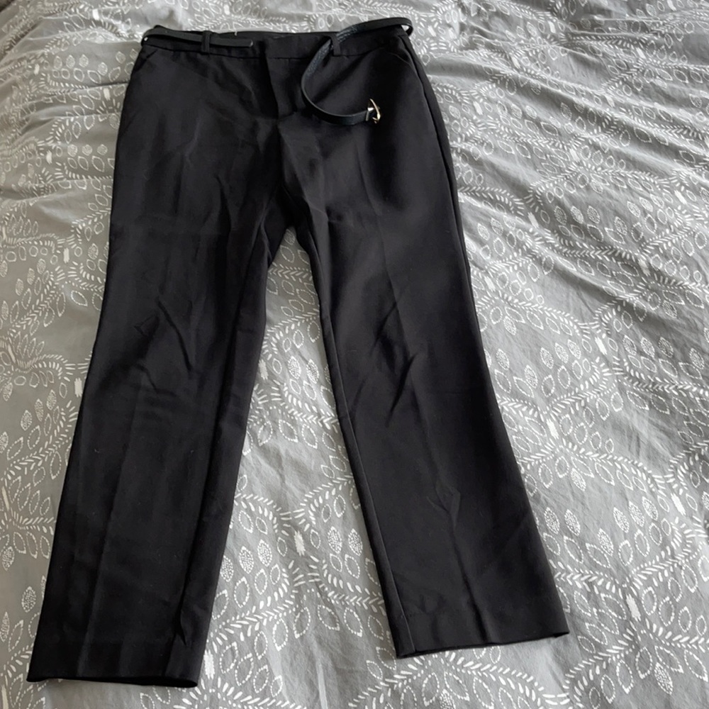 Black office-style pants with belt. Stradivarius